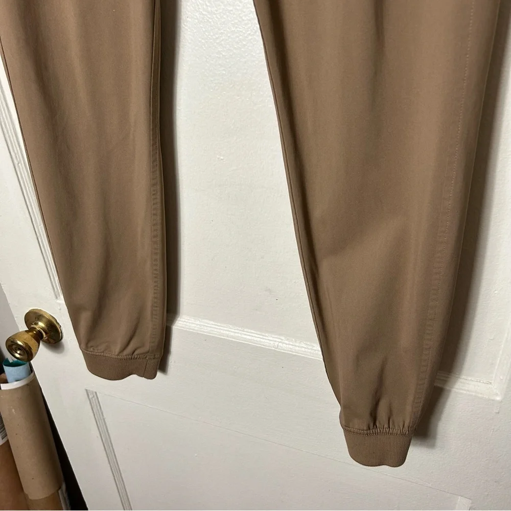 Rhone tan commuter performance joggers men's S pull on drawstring